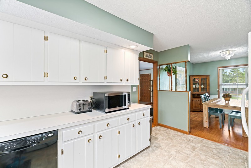 2300 Raspberry Lane Lebanon, TN 37087 - Photo 17 of 48 a kitchen with white cabinets and sink