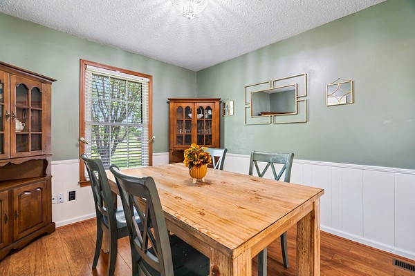 2300 Raspberry Lane Lebanon, TN 37087 - Photo 19 of 48 a view of a dining room with furniture window and wooden floor