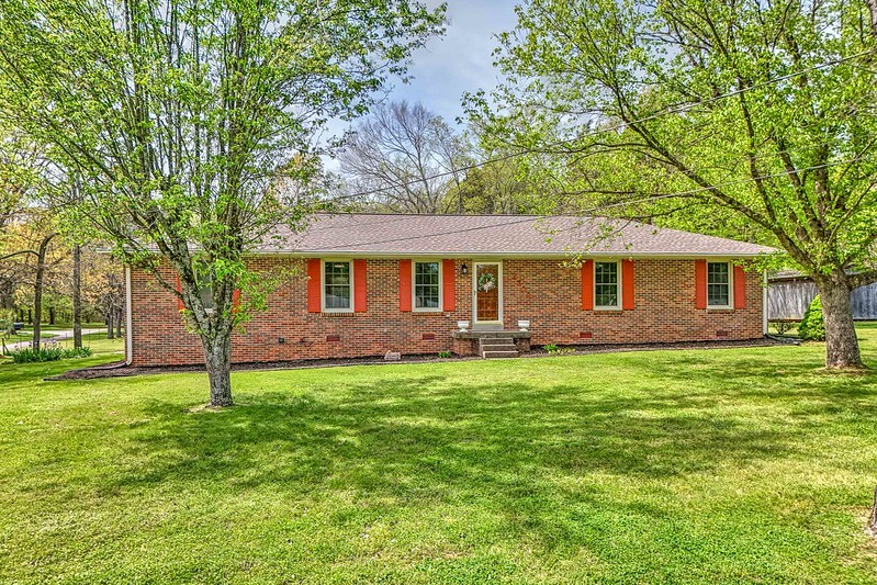 2300 Raspberry Lane Lebanon, TN 37087 - Photo 2 of 48 a backyard of a house with seating space