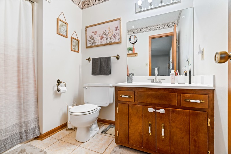 2300 Raspberry Lane Lebanon, TN 37087 - Photo 24 of 48 a bathroom with a sink toilet and mirror