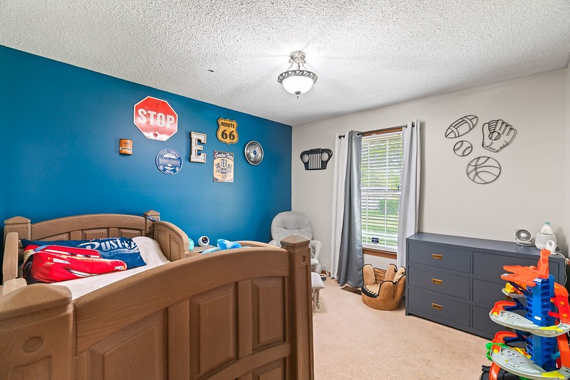 2300 Raspberry Lane Lebanon, TN 37087 - Photo 28 of 48 a bedroom with a bed and furniture