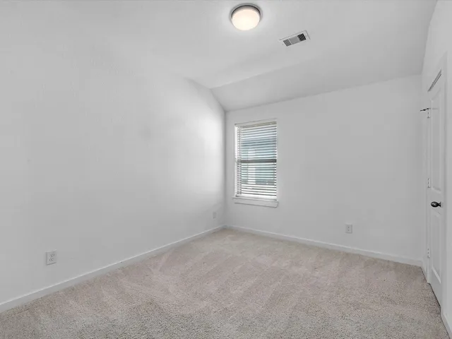 a view of a yard in front of house