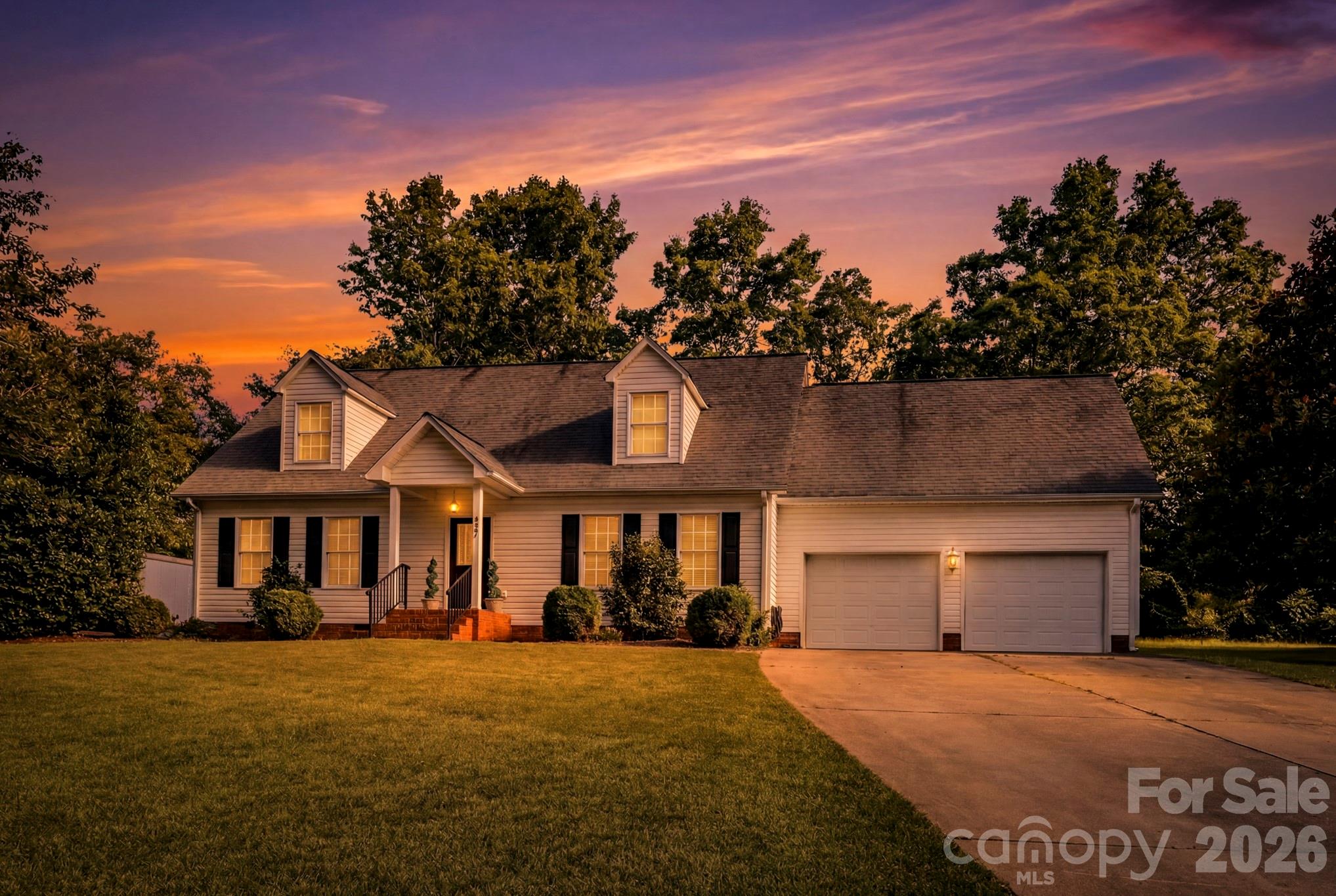 327 Sherry Street Rutherfordton, NC 28139 - Photo 2 of 22 a front view of a house with a yard and garage