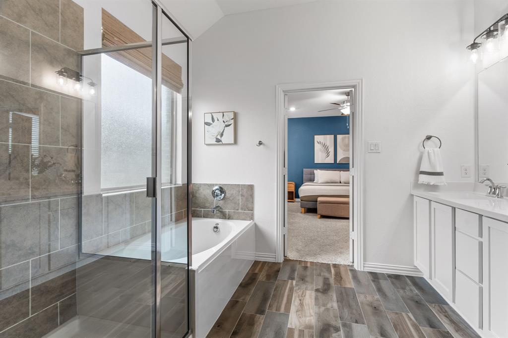 4324 Coffee Mill Road Celina, TX 75078 - Photo 22 of 38 a en suite spacious bathroom with a tub and shower