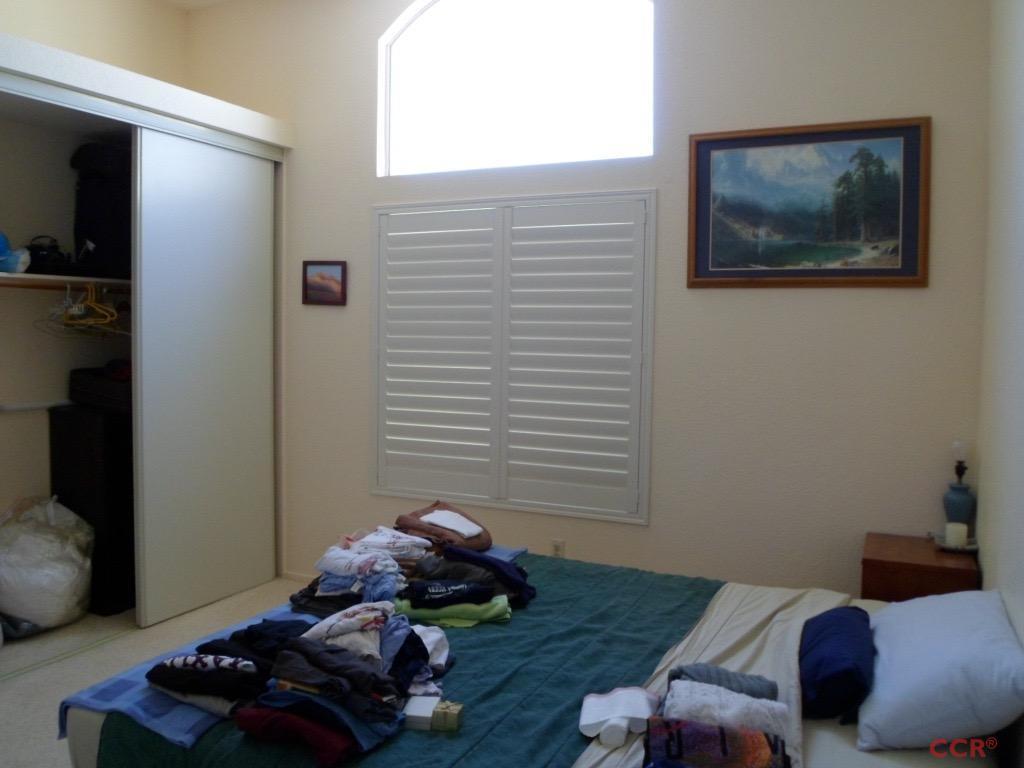 1434 Roper Way Santa Maria, CA 93455 - Photo 12 of 18 a bedroom with a bed and a couch