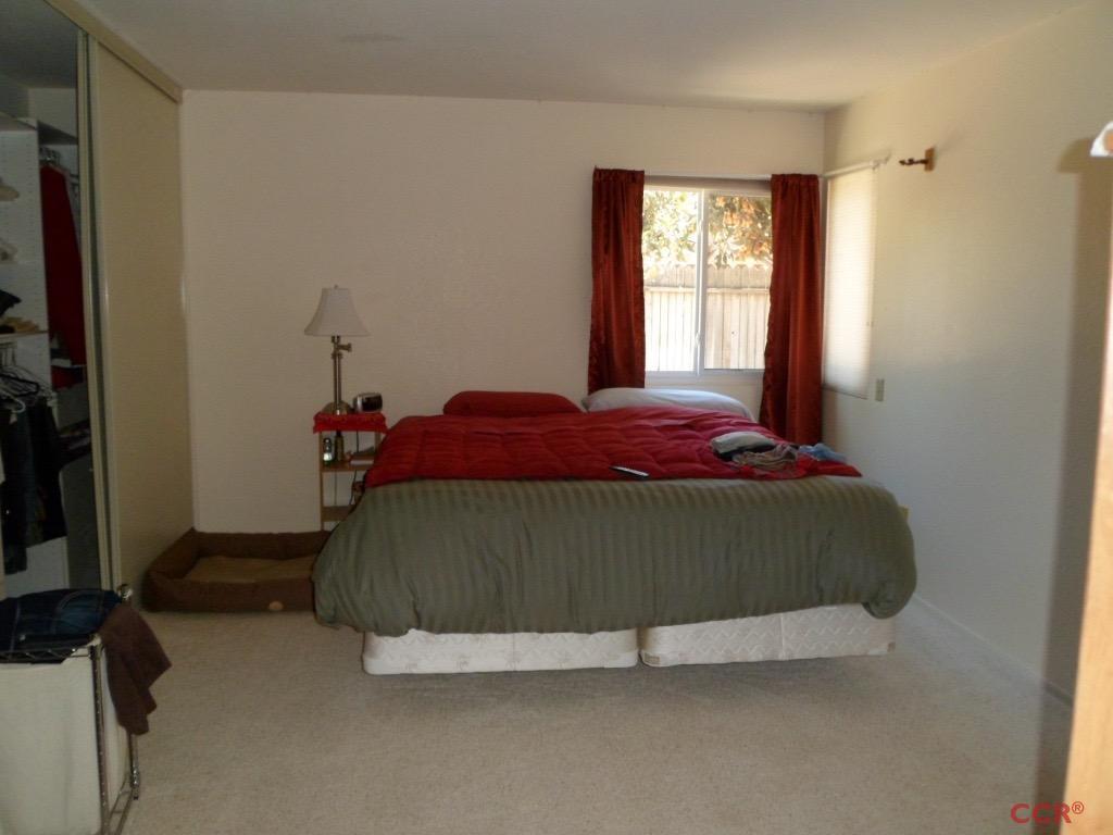 1434 Roper Way Santa Maria, CA 93455 - Photo 15 of 18 a bedroom with a bed and window