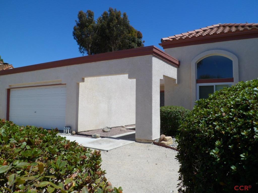 1434 Roper Way Santa Maria, CA 93455 - Photo 2 of 18 a front view of a house with a yard