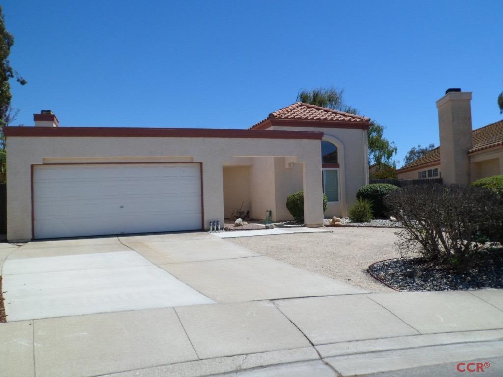 1434 Roper Way Santa Maria, CA 93455 - Photo 3 of 18 a front view of a house with a yard