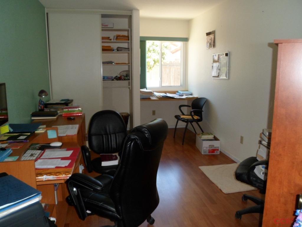 1434 Roper Way Santa Maria, CA 93455 - Photo 10 of 18 a view of a workspace with furniture and a window