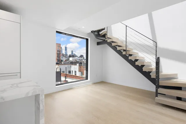 a view of an entryway with staircase