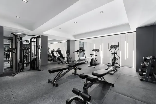 a view of a room with gym equipment