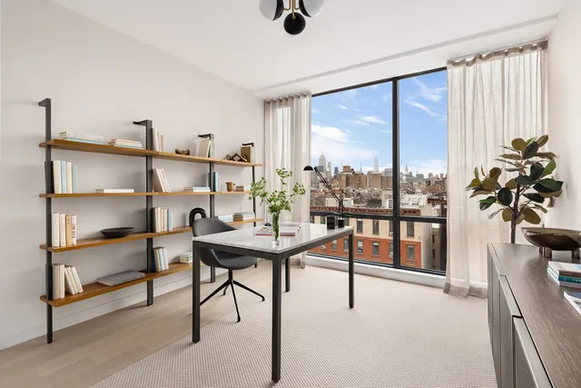 a view of a livingroom with furniture