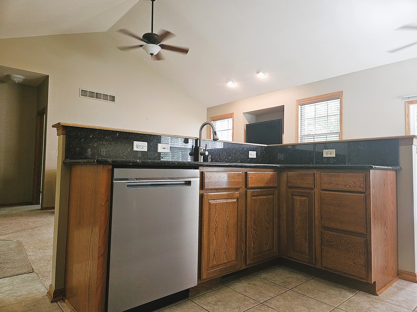 1670 Overlook Drive Dixon, IL 61021 - Photo 4 of 36 a kitchen with a sink and a refrigerator