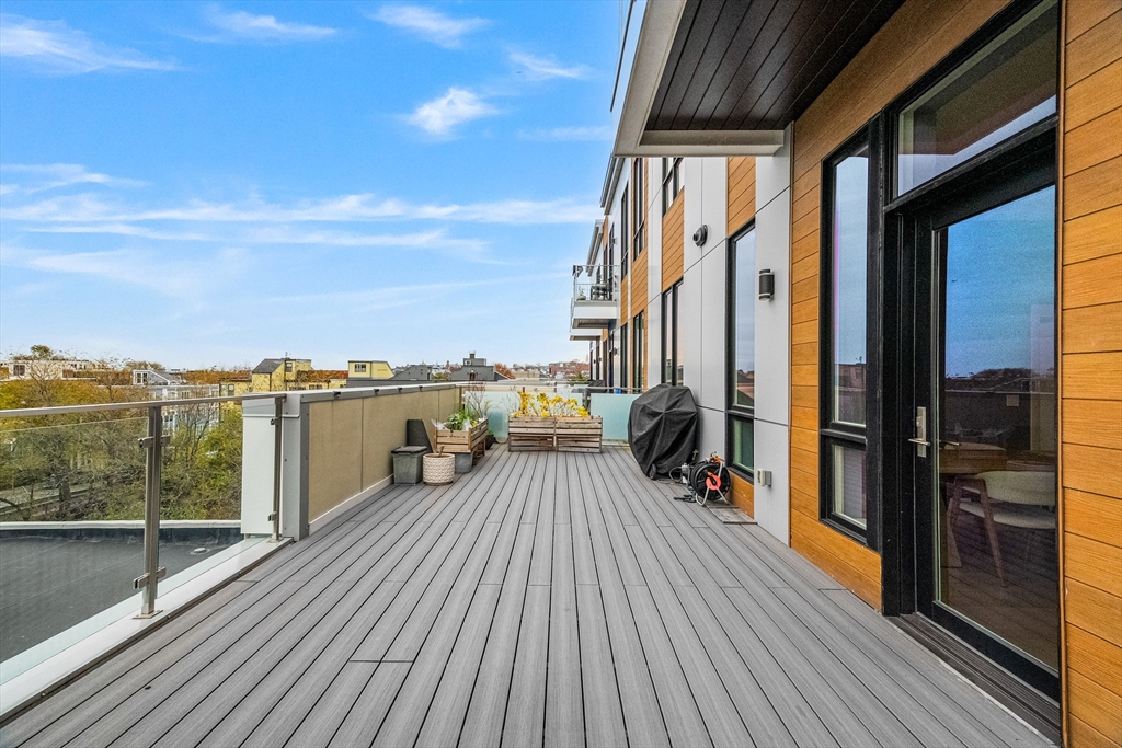 20 West Fifth Street, Unit 5E Boston, MA 02127 - Photo 12 of 42 a view of roof deck with patio