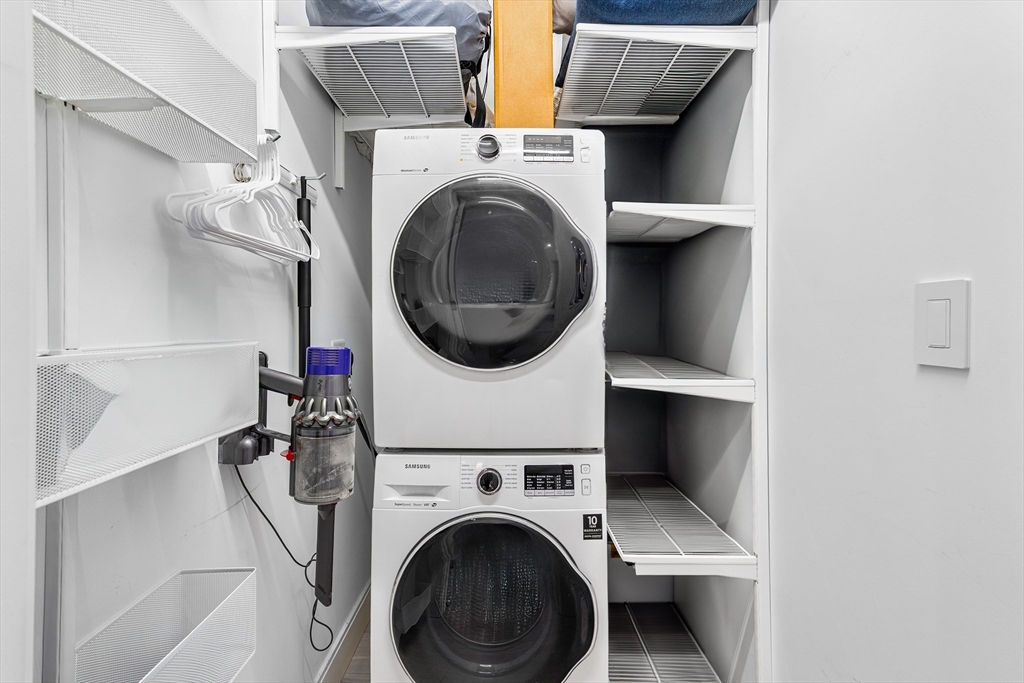 20 West Fifth Street, Unit 5E Boston, MA 02127 - Photo 23 of 42 a utility room with dryer and washer