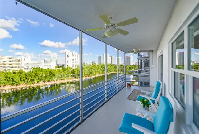 a view of living room with furniture and garden view