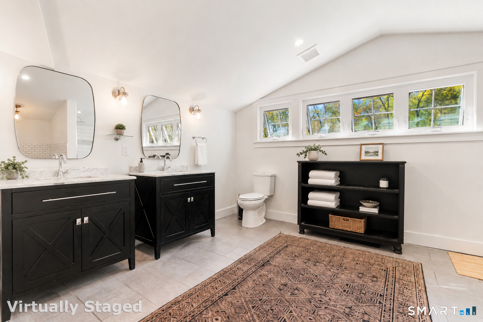 9 Maplewood Road Ridgefield, CT 06877 - Photo 20 of 39 a bathroom with a double vanity sink toilet and a mirror