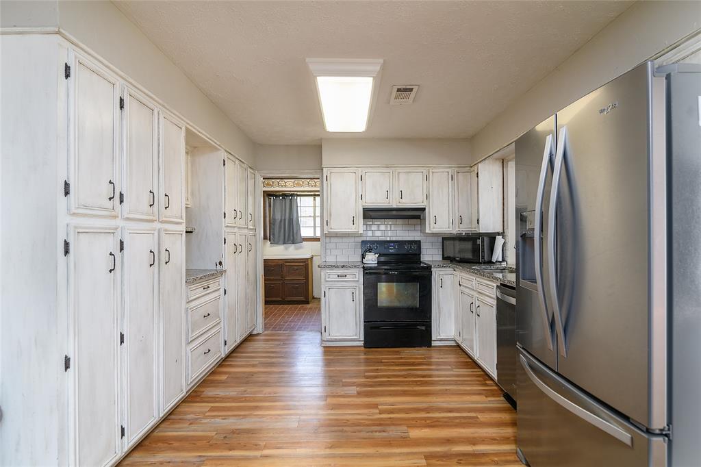 231 Grant Circle Doyline, LA 71023 - Photo 4 of 24 Kitchen Offers Tons of Built In Cabinets
