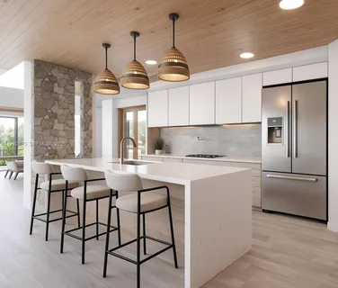 a kitchen with stainless steel appliances granite countertop a stove a refrigerator a oven a sink with island chairs and wooden cabinets