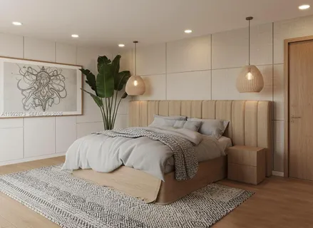 a bed room with a bed mirror and a window