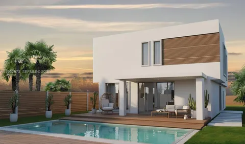 a view of a house with a swimming pool