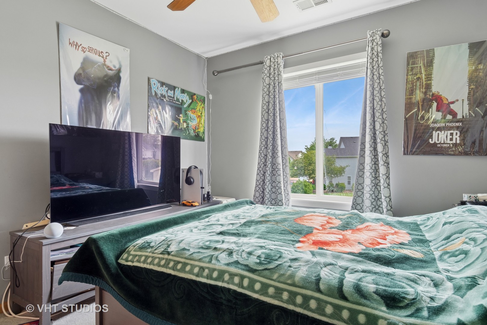 2477 Smithfield Court Aurora, IL 60503 - Photo 14 of 17 a bedroom with a bed and a flat screen tv