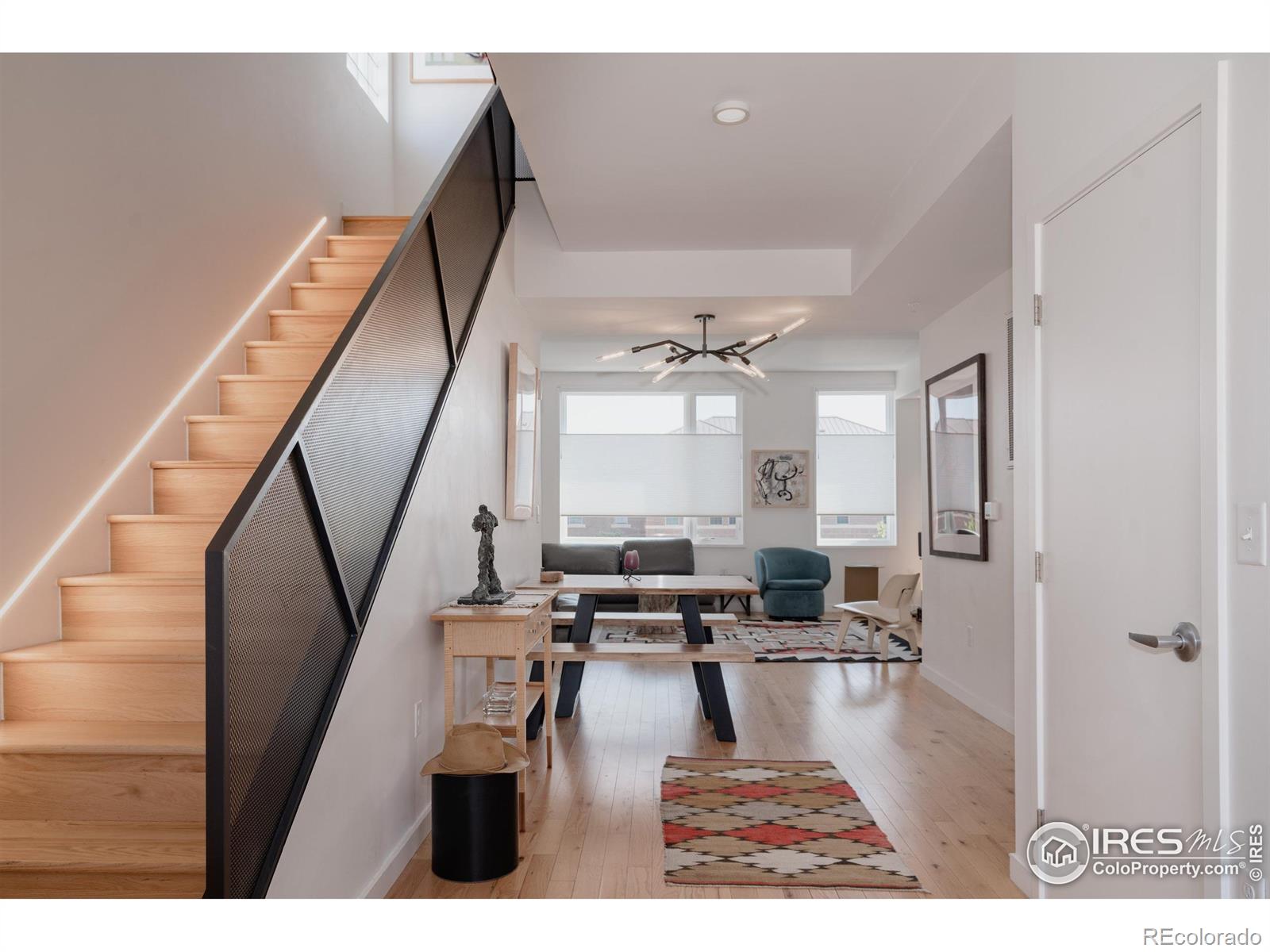 401 Linden Street, Unit 3336 Fort Collins, CO 80524 - Photo 19 of 43 a living room with furniture and wooden floor