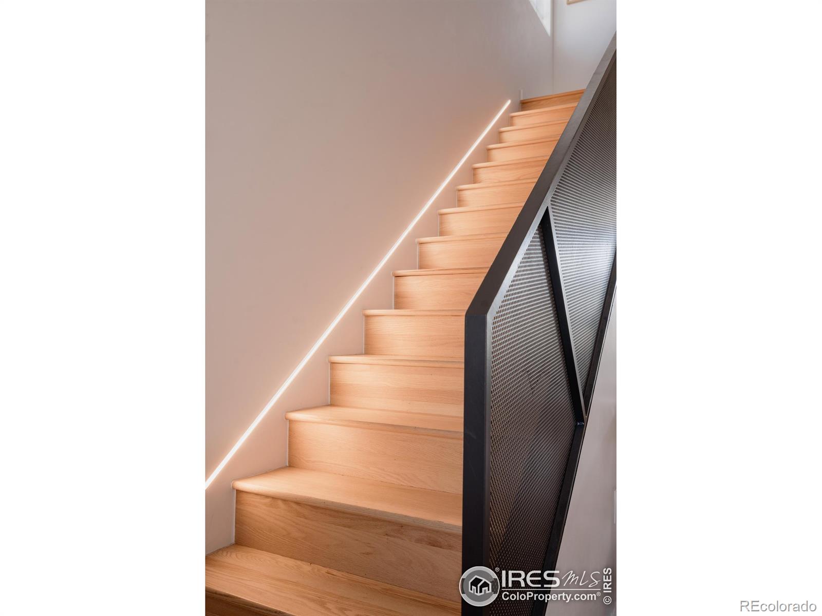 401 Linden Street, Unit 3336 Fort Collins, CO 80524 - Photo 20 of 43 a view of staircase with white walls