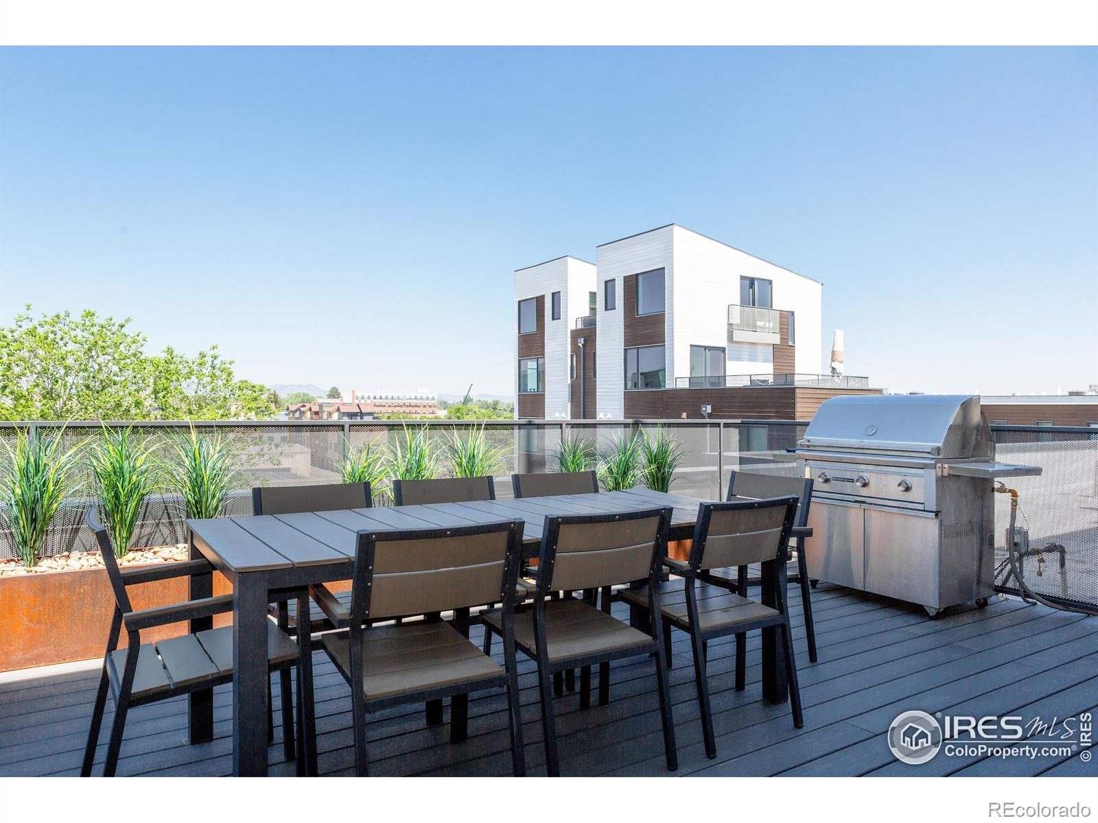 401 Linden Street, Unit 3336 Fort Collins, CO 80524 - Photo 37 of 43 a view of a dining room with furniture and wooden floor