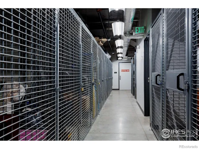 a picture of a room with wooden floor and white walls