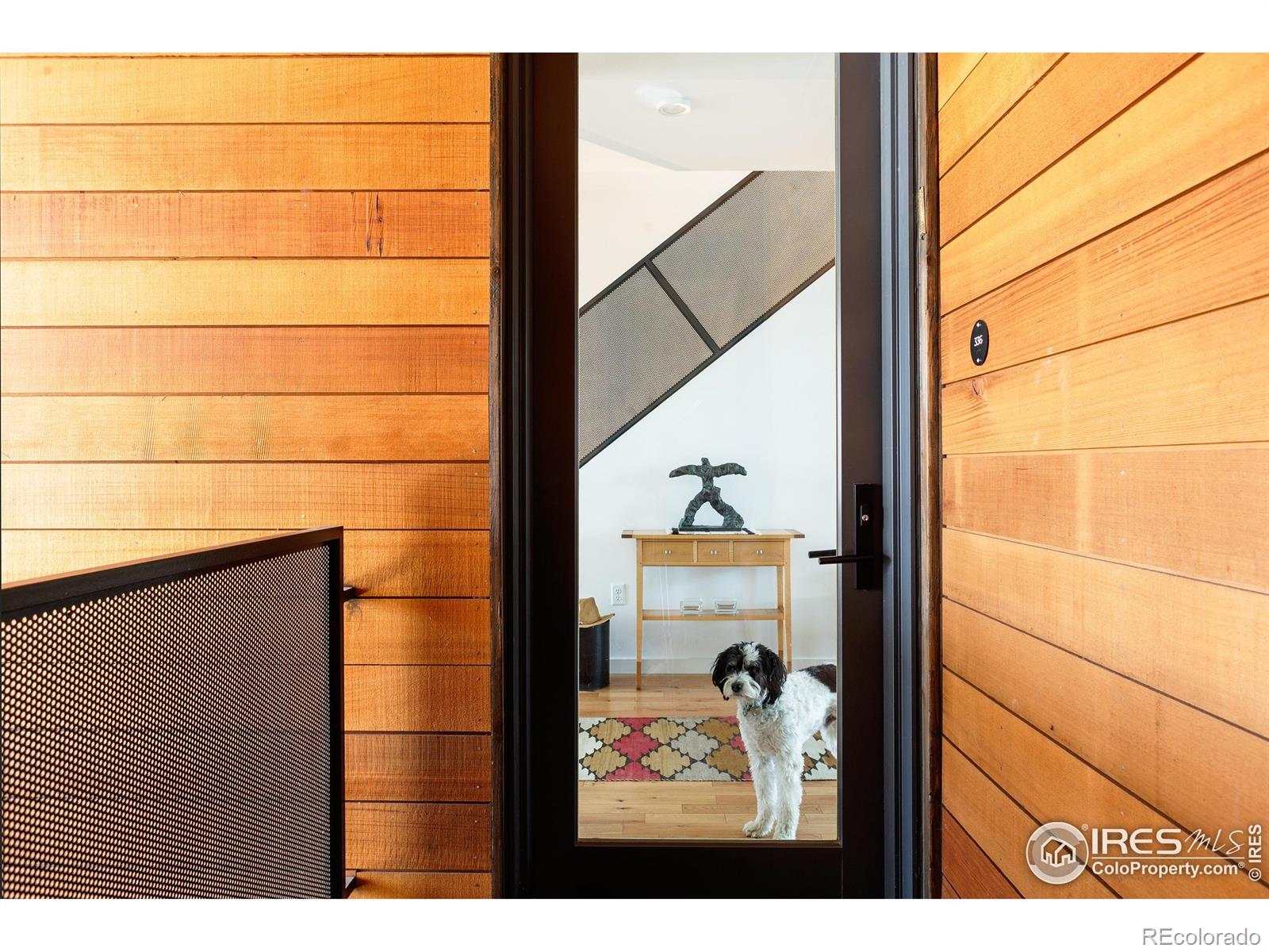 401 Linden Street, Unit 3336 Fort Collins, CO 80524 - Photo 43 of 43 a view of a balcony with wooden floor
