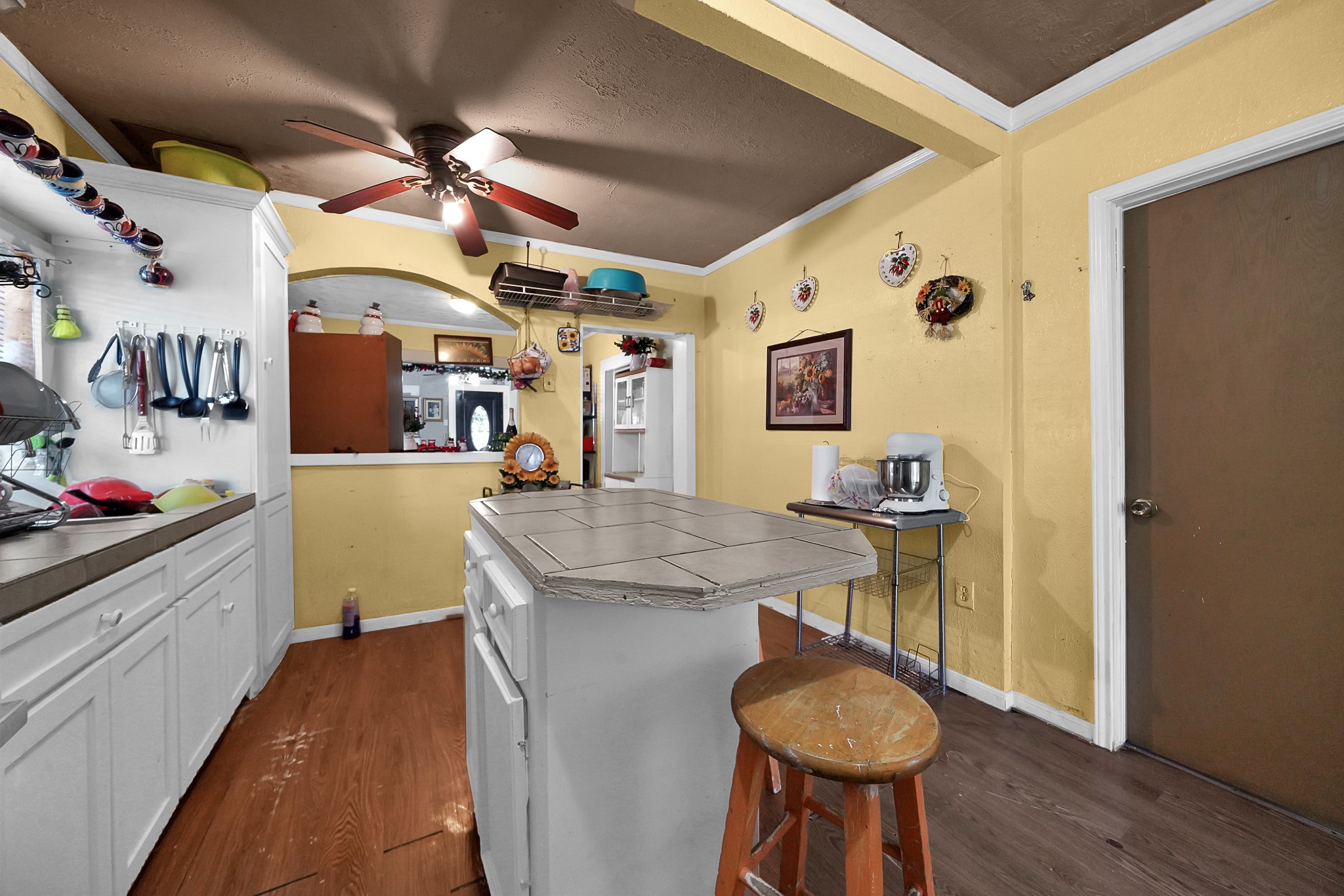 4811 Terry Street Houston, TX 77009 - Photo 19 of 30 a kitchen with stainless steel appliances granite countertop a sink and a refrigerator