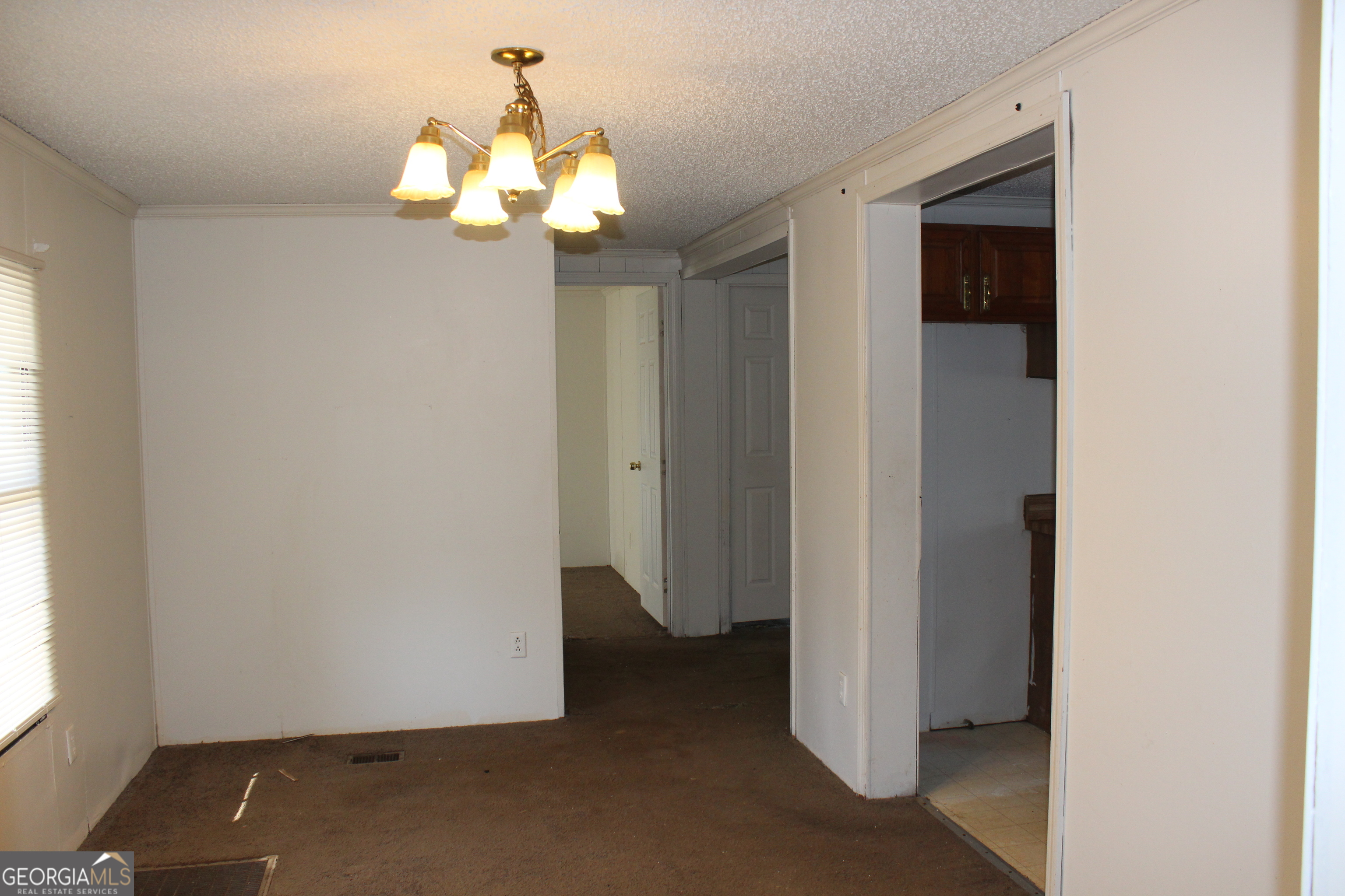 1691 A Rover Zetella Road Williamson, GA 30292 - Photo 15 of 24 a view of an empty room with a window