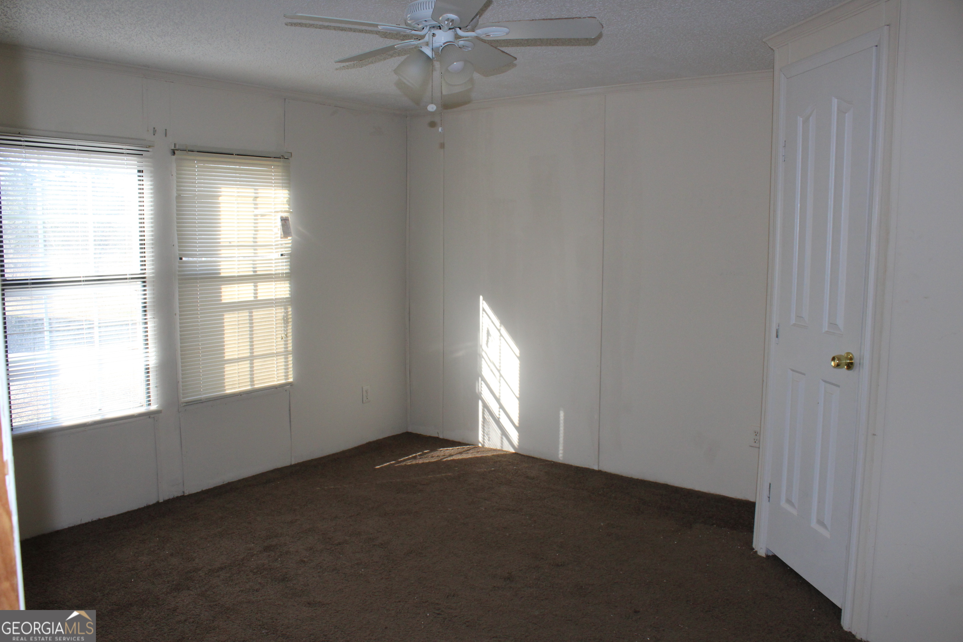 1691 A Rover Zetella Road Williamson, GA 30292 - Photo 22 of 24 an empty room with a window