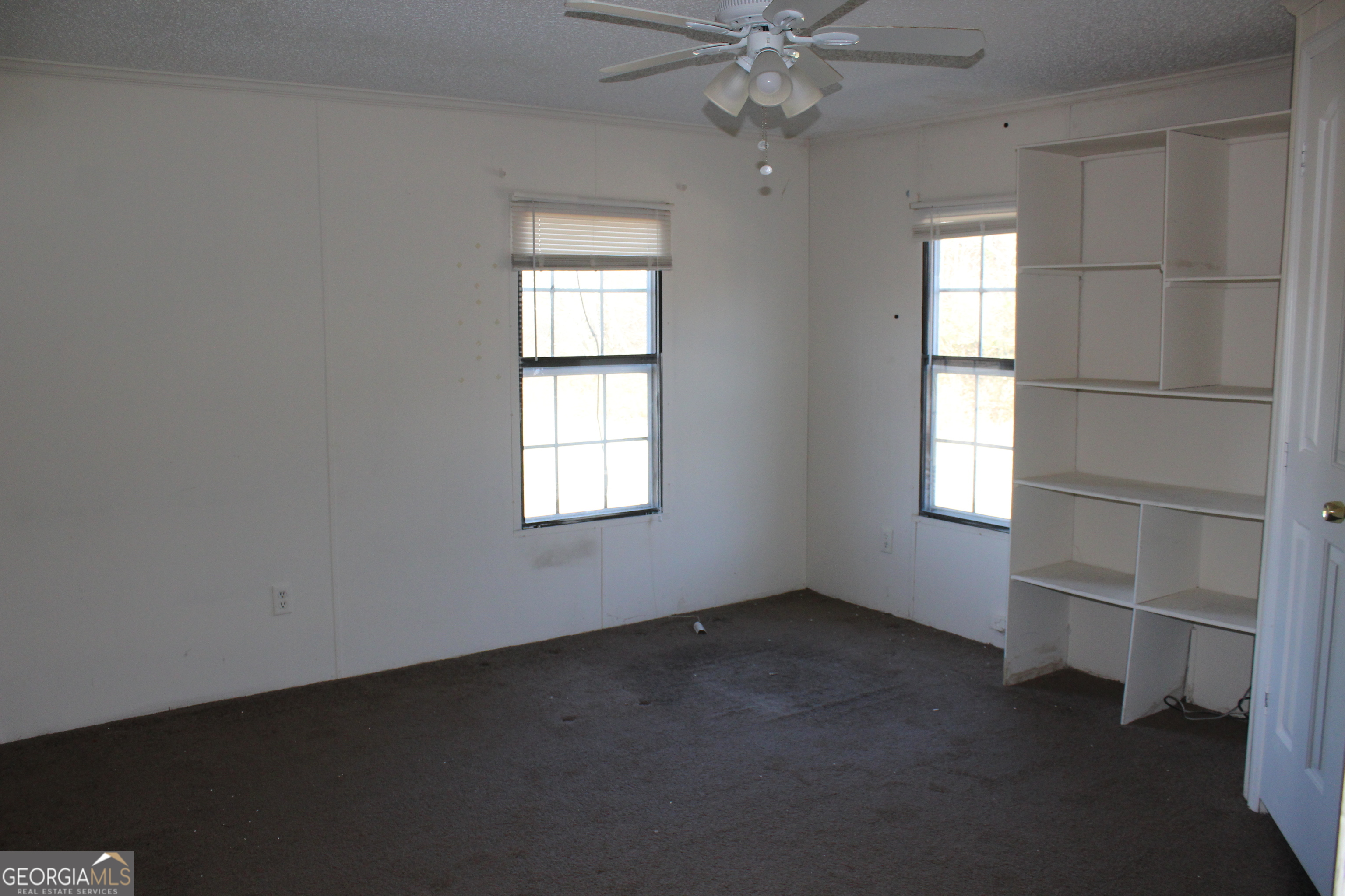 1691 A Rover Zetella Road Williamson, GA 30292 - Photo 23 of 24 an empty room with a window