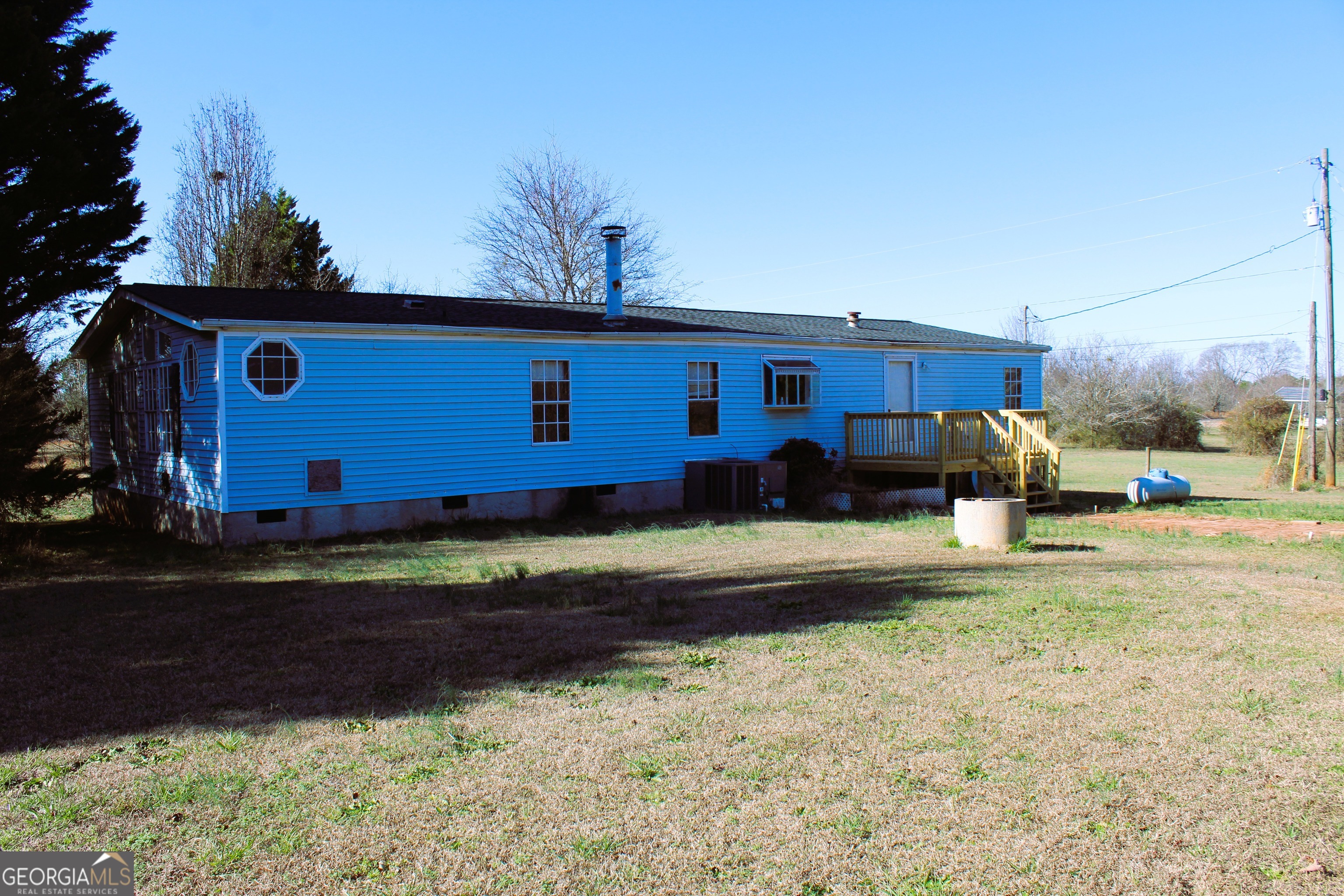 1691 A Rover Zetella Road Williamson, GA 30292 - Photo 8 of 24 a view of backyard of the house