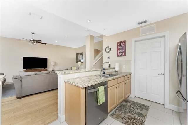 a bedroom with bed and wooden floor