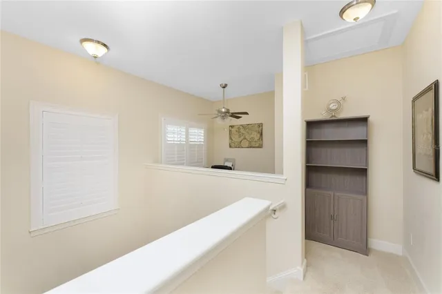 a view of a dining room with furniture wooden floor and a flat screen tv