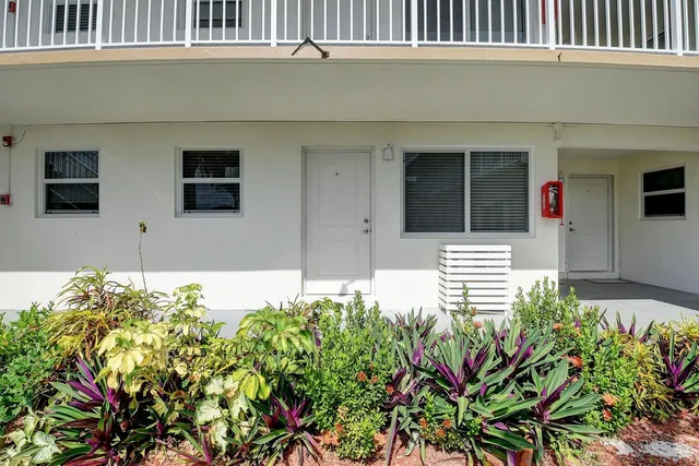 a flower plants in front of a building