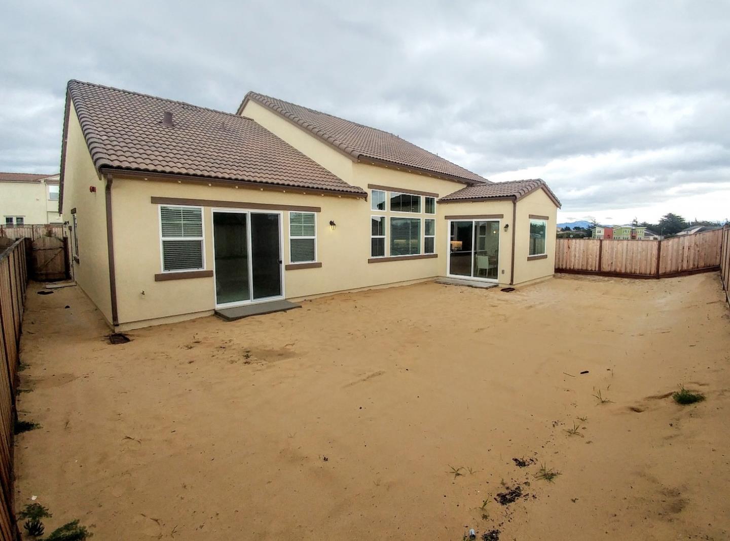 602 Braden Way Marina, CA 93933 - Photo 12 of 13 a view of a house with a outdoor space