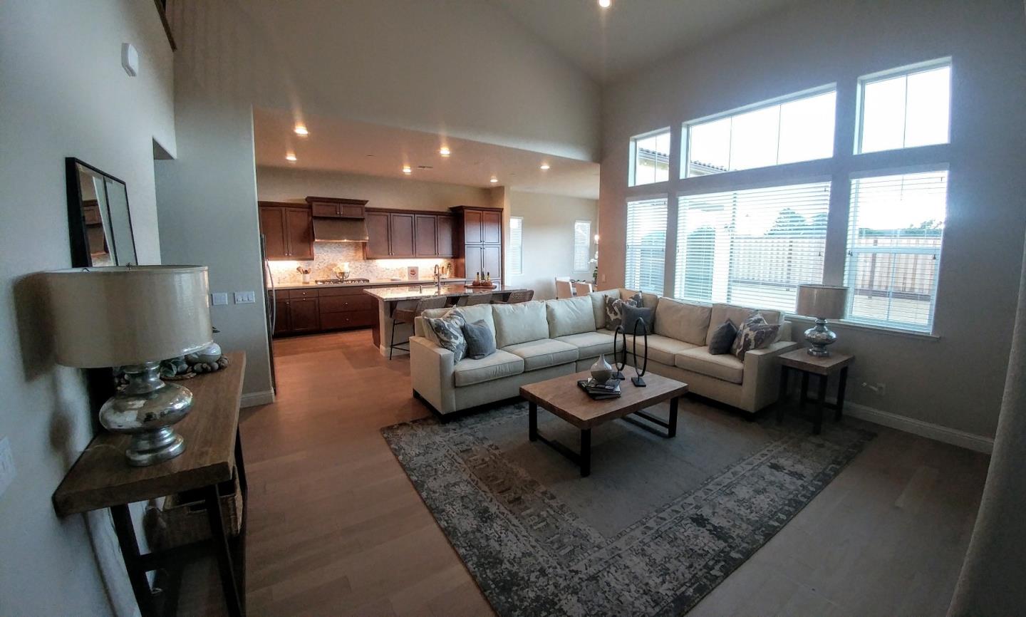602 Braden Way Marina, CA 93933 - Photo 7 of 13 a living room with furniture and a large window