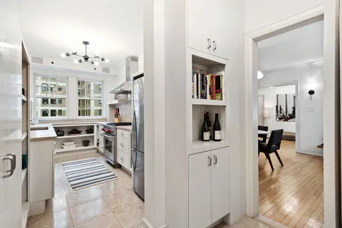a view of a living room and dining room
