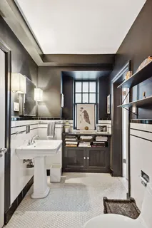 a large kitchen with a stove a sink dishwasher and a refrigerator