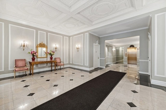 415 West Aldine Avenue, Unit 9D Chicago, IL 60657 - Photo 26 of 32 a living room with furniture and a table