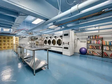 a view of a building with sitting area