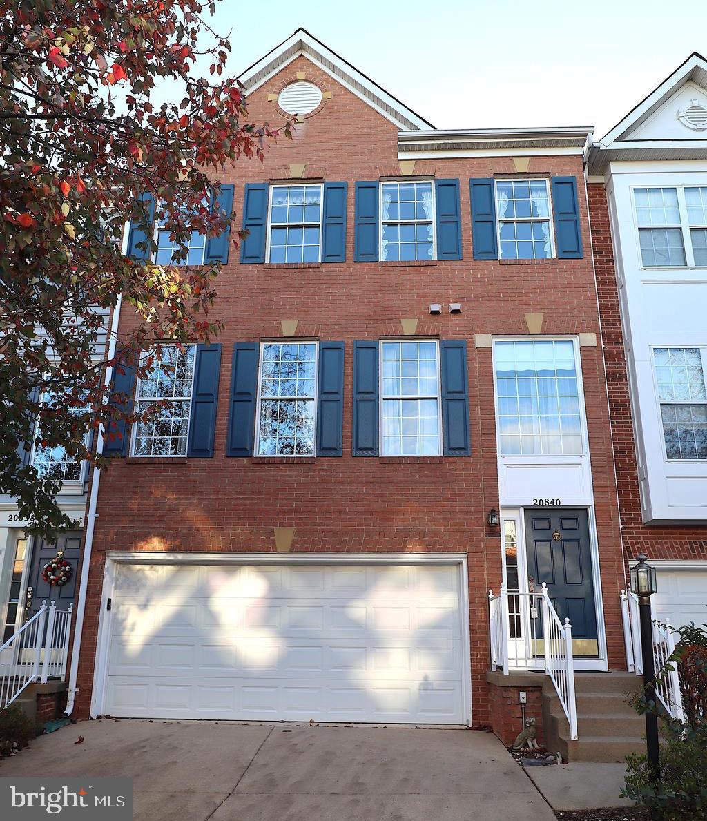 20840 Miranda Falls Square Sterling, VA 20165 - Photo 1 of 17 a front view of a house