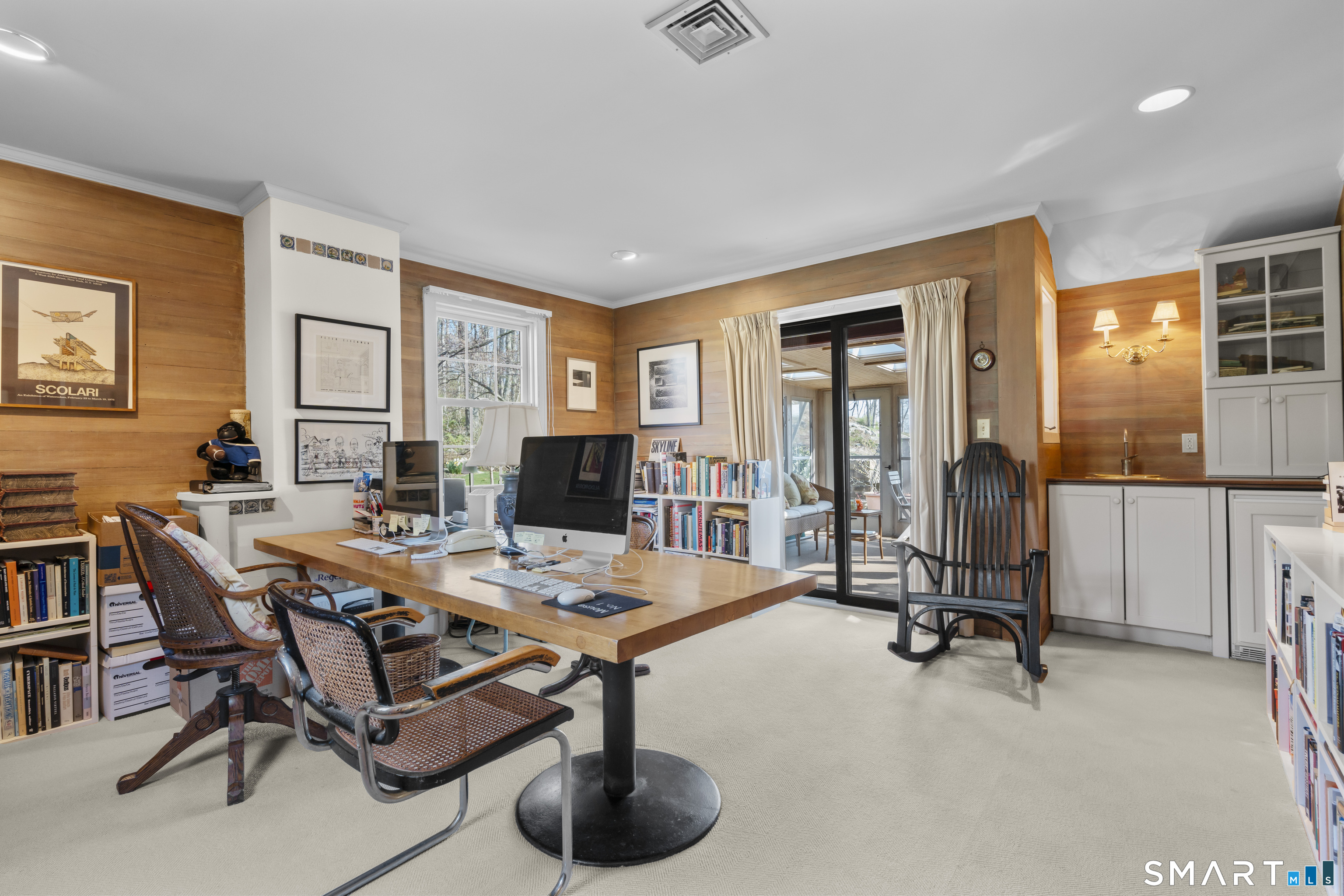 55-69 Sawmill Road Branford, CT 06405 - Photo 21 of 40 a view of a livingroom with workspace and a window