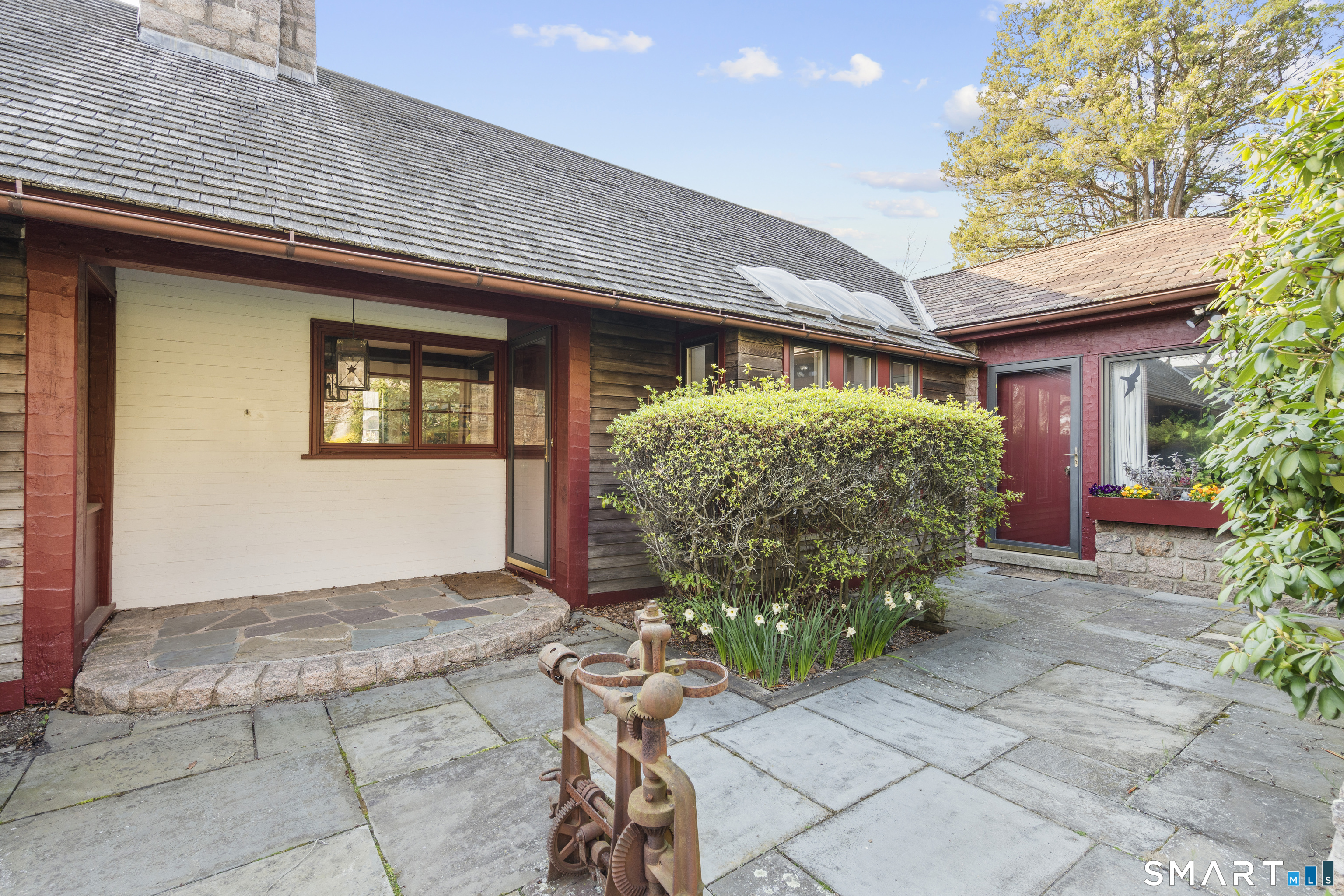 55-69 Sawmill Road Branford, CT 06405 - Photo 6 of 40 a front view of a house