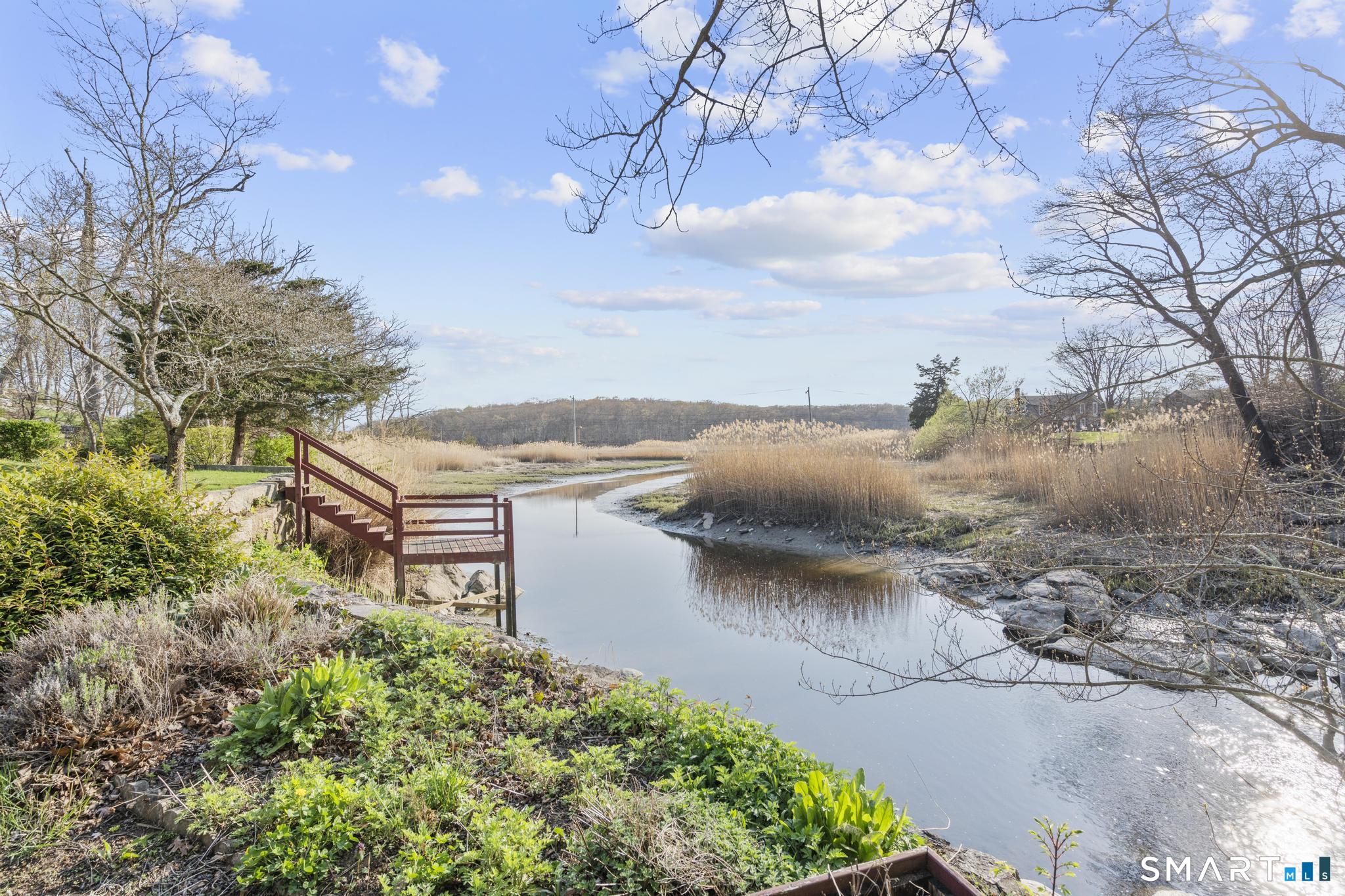 55-69 Sawmill Road Branford, CT 06405 - Photo 7 of 40 a view of a lake with outside space