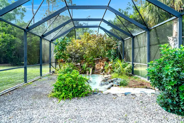 a yellow room with lots of green space